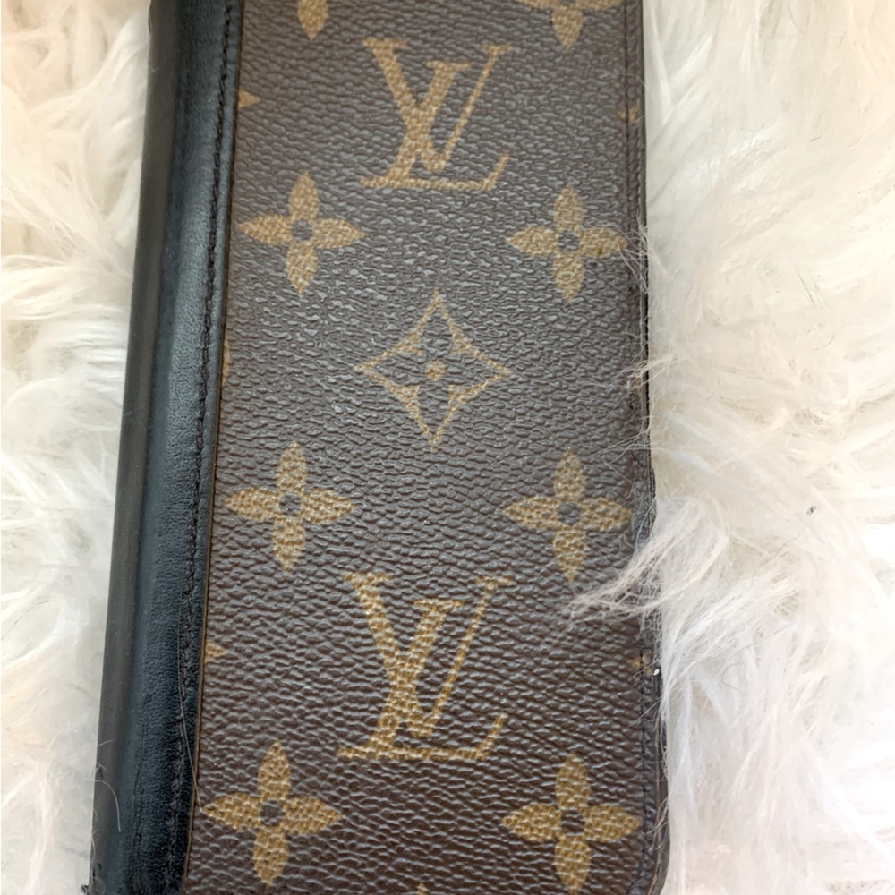 Louis Vuitton XS folio cover. Monogram with noir. Very well loved and used.